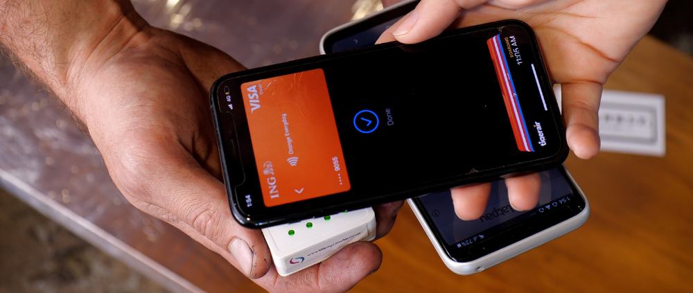 Using a mobile to make a payment on Latpay's all-in-one terminal